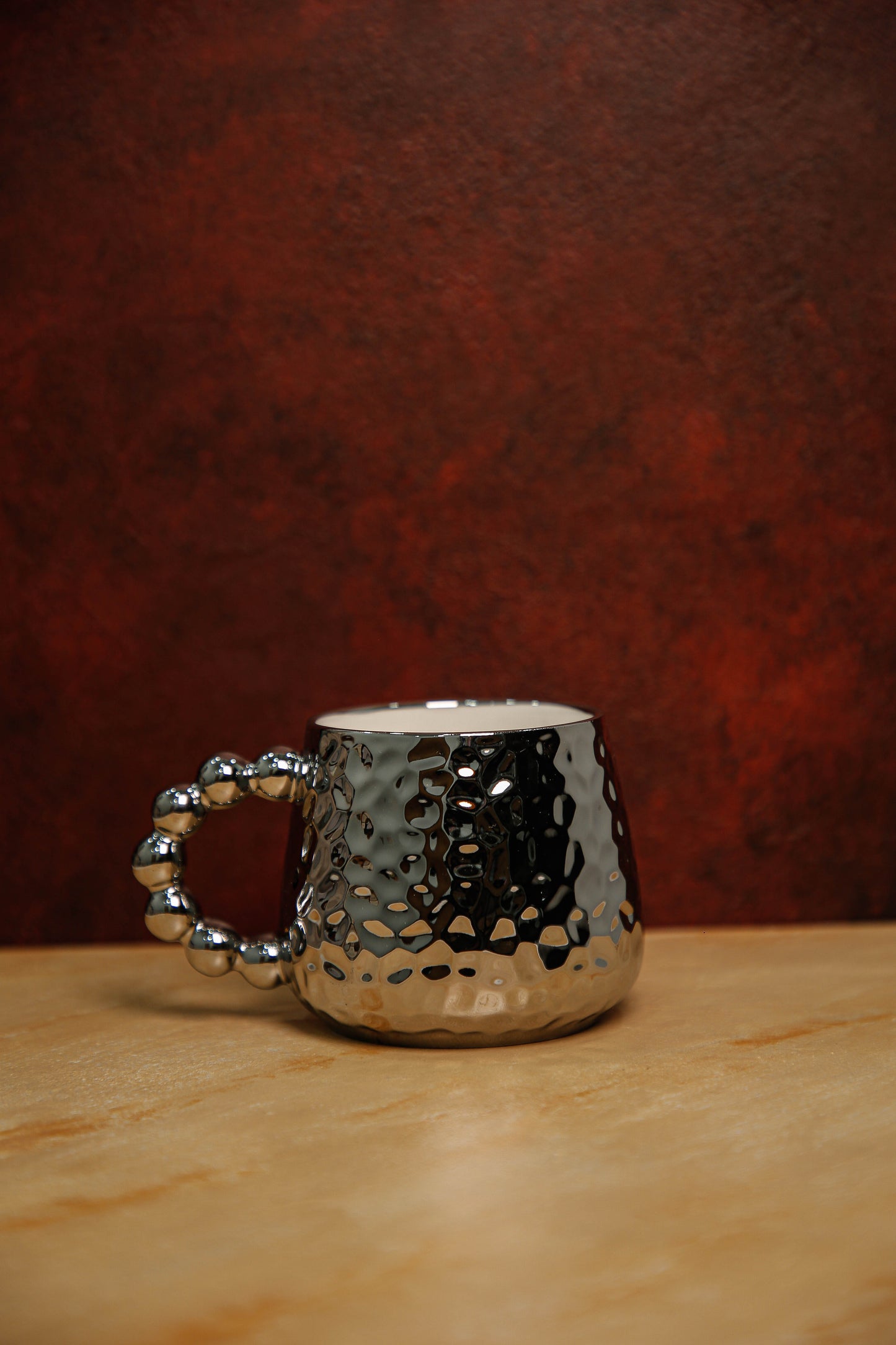 Glossy silver mug